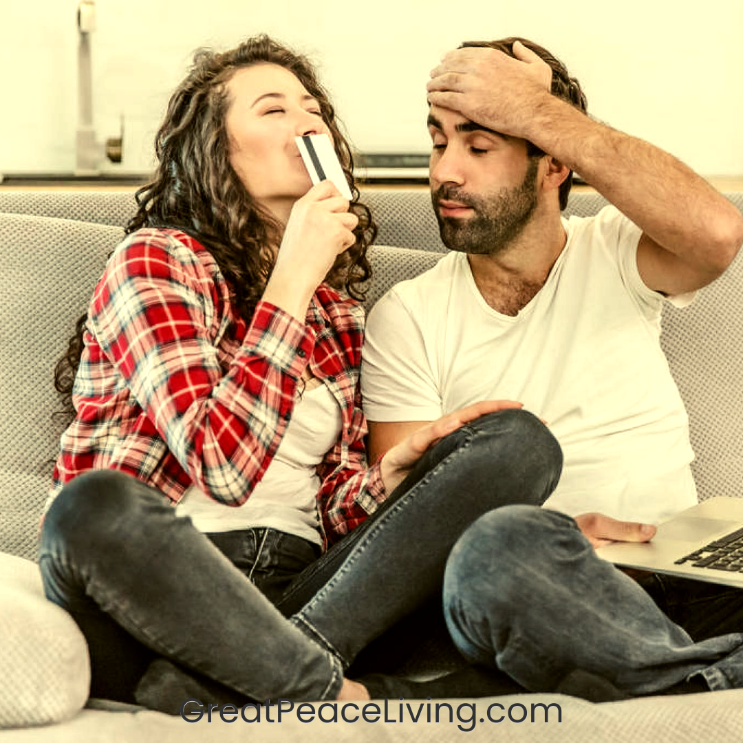 couple arguing over finances while woman holds credit card, from blog: Secrets to Having a Long-lasting Marriage | GreatPeaceLiving.com #marriagemoments #marriage